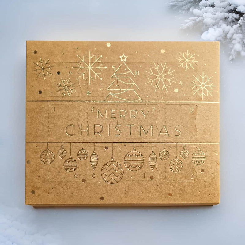 Kraft advent calendar with Christmas designs on a light gray background