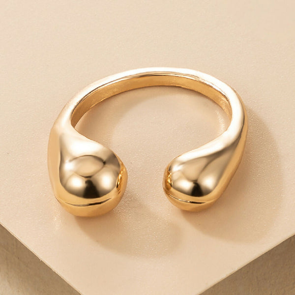 The Water Drop Ring in Gold & Silver
