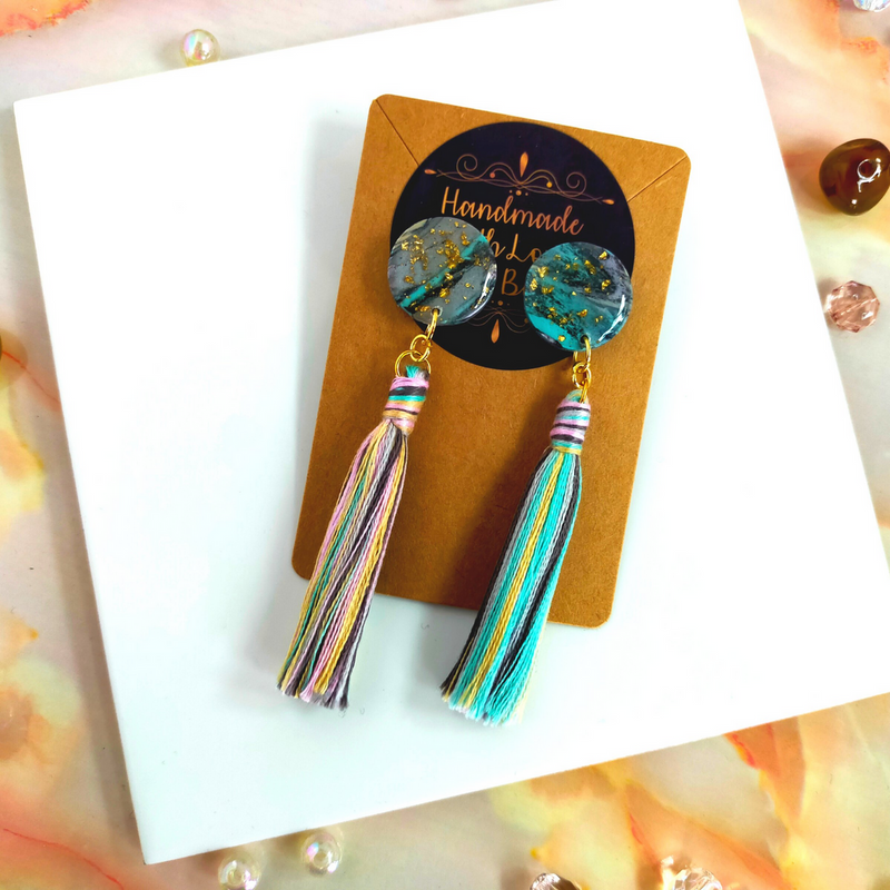 Handmade in our West Yorkshire Studio, these unique, one-of-a-kind faux marbled polymer clay earrings with tassel charm are the perfect gift for any stylish women.