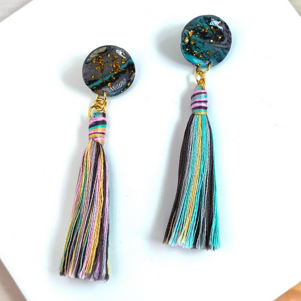 Handmade in our West Yorkshire Studio, these unique, one-of-a-kind faux marbled polymer clay earrings with tassel charm are the perfect gift for any stylish women.