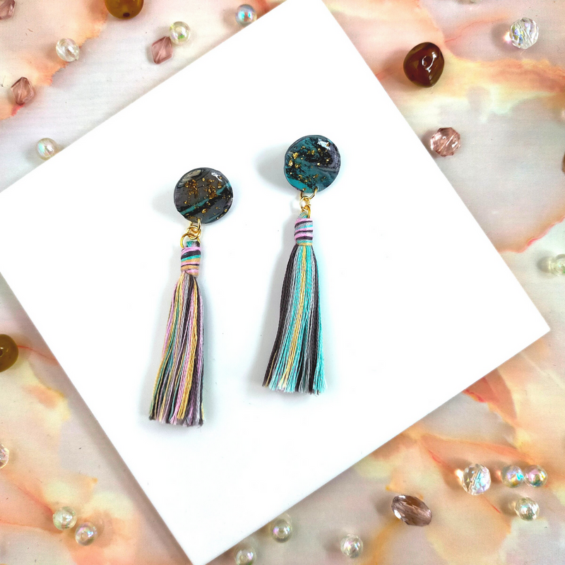Handmade in our West Yorkshire Studio, these unique, one-of-a-kind faux marbled polymer clay earrings with tassel charm are the perfect gift for any stylish women.