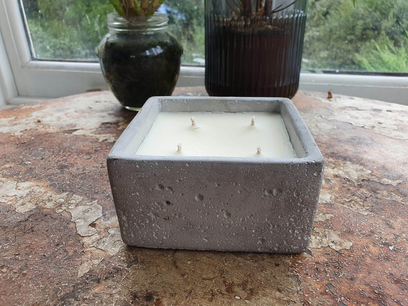 Urban candle in concrete square