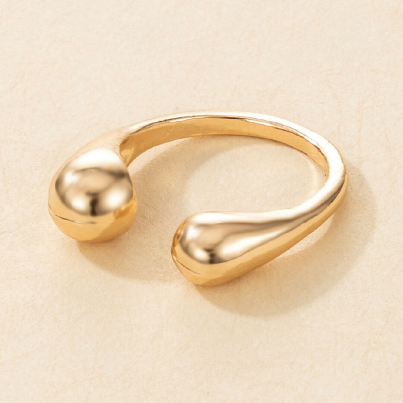 The Water Drop Ring in Gold & Silver