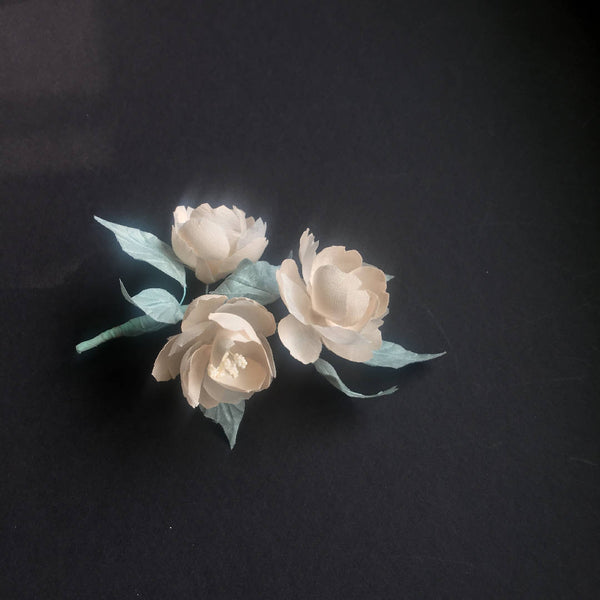 White flower brooch