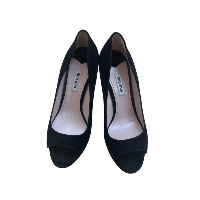 beautiful black stilleto pump heels by miu miu