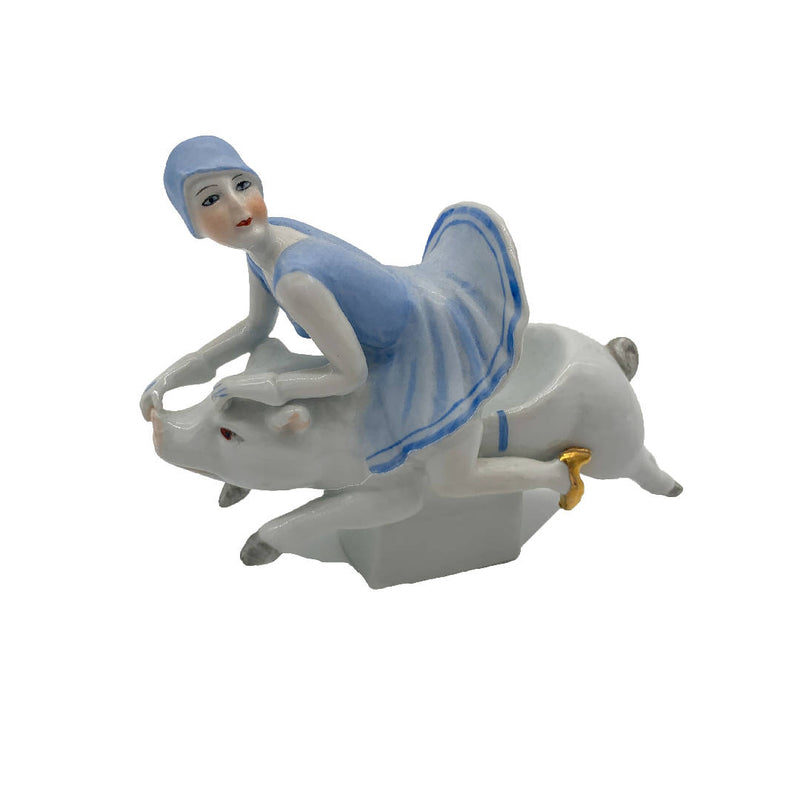 Vintage Art deco beautiful ceramic showpiece of a lady riding a pig with golden shoes