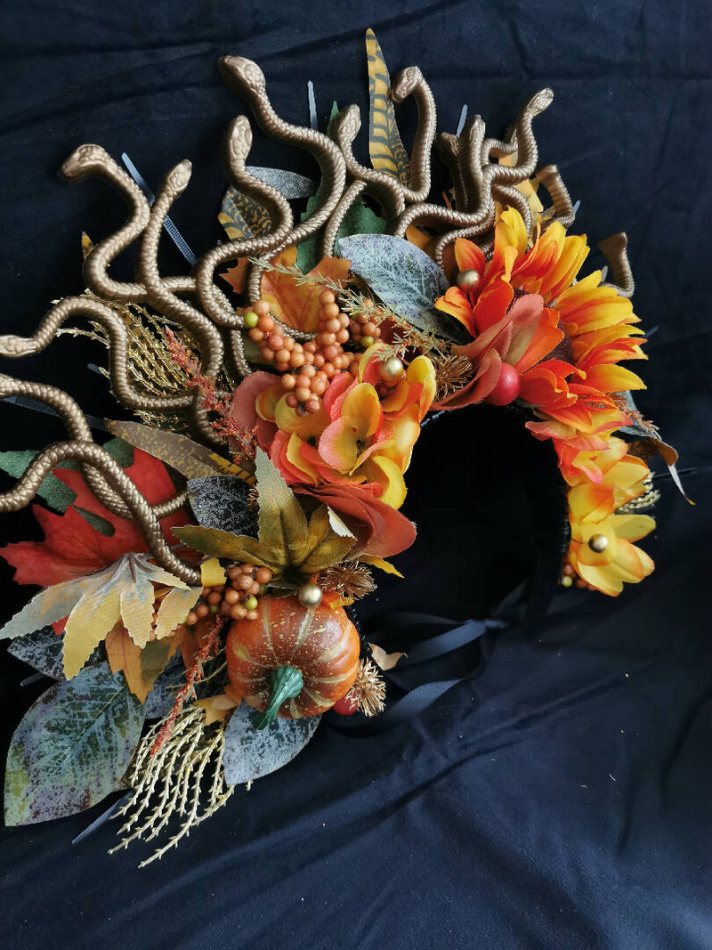 Unleash Your Inner Royalty with this Stunning Orange Crown adorned with Snakes and Flowers – Perfect for Photo Shoots and Carnival Fun