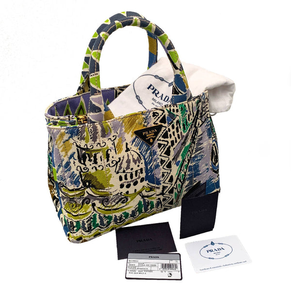 A new PRADA Cityscape Limited Edition Canapa woven graphic printed tote handbag with handles and detachable strap