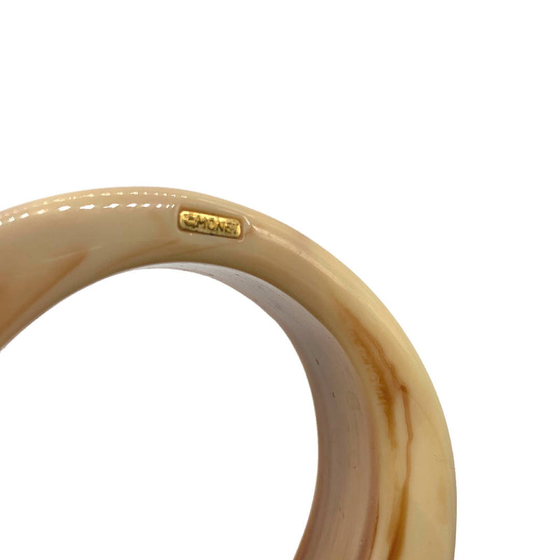 vintage designer beige asymmetrical circular plastic bangle by Omonet