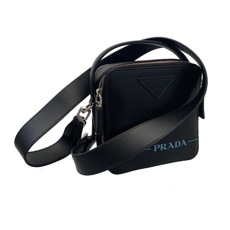 New Limited Edition PRADA Authentic black crossbody mini bag in square shape with zipper closure and detachable strap