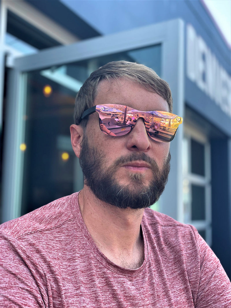 Bearded brent in Rose gold SAARA shades with black walnut hand made arms, you can see the reflection of the brewery patio in the lenses.