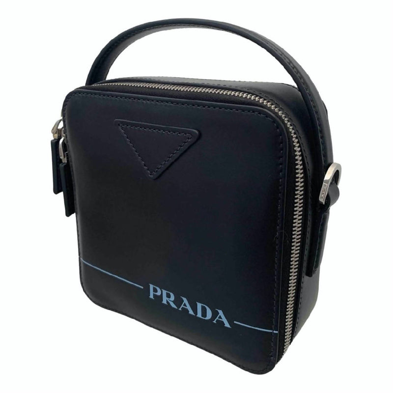 New Limited Edition PRADA Authentic black crossbody mini bag in square shape with zipper closure and detachable strap