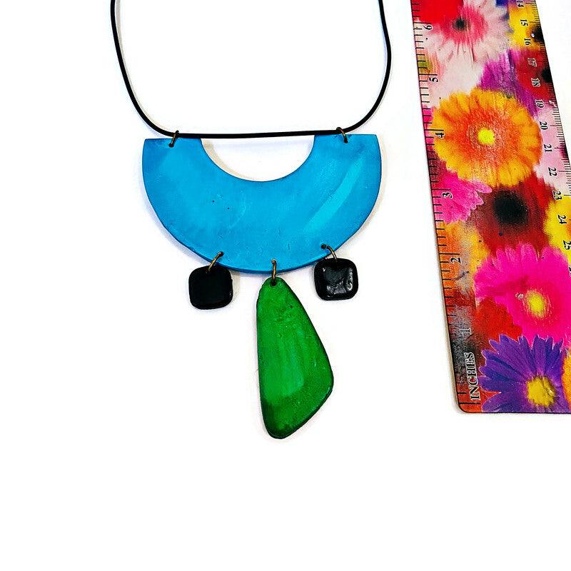 Quirky Statement Bib Necklace with Dangling Geometric Shapes- "Ricki"