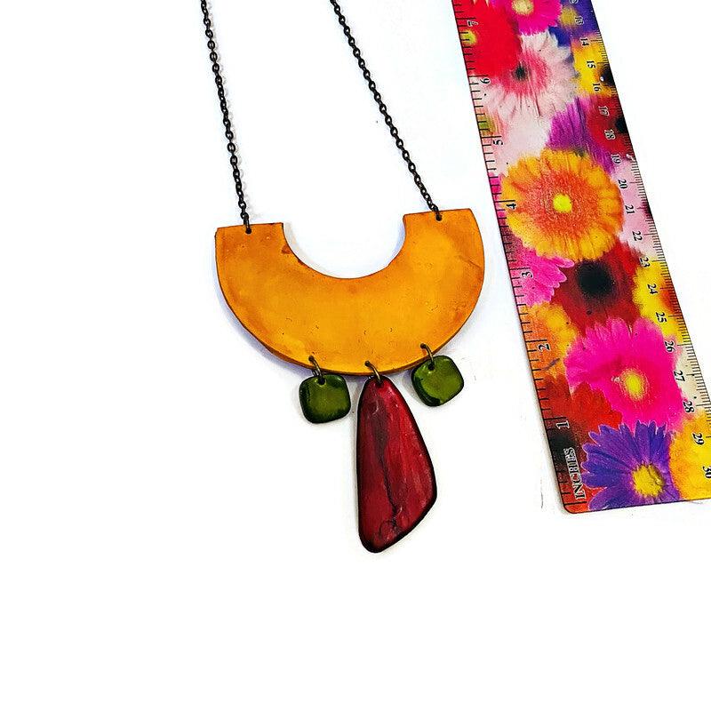 Quirky Statement Bib Necklace with Dangling Geometric Shapes- "Ricki"