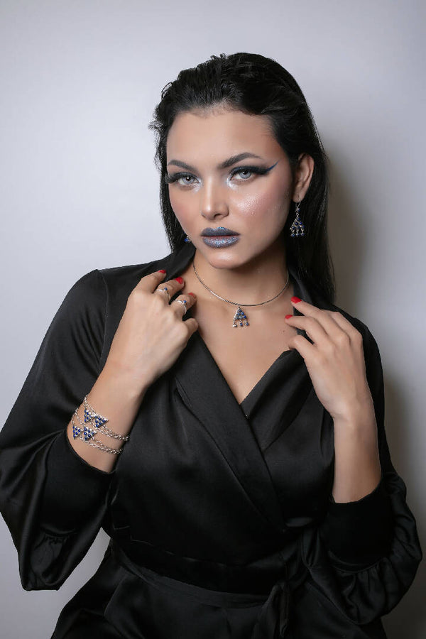 Sliver Hasli with one lapis Lazuli triangle