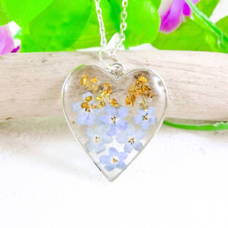 Dried Flower Forget Me Not Heart Resin Necklace. by Roelene