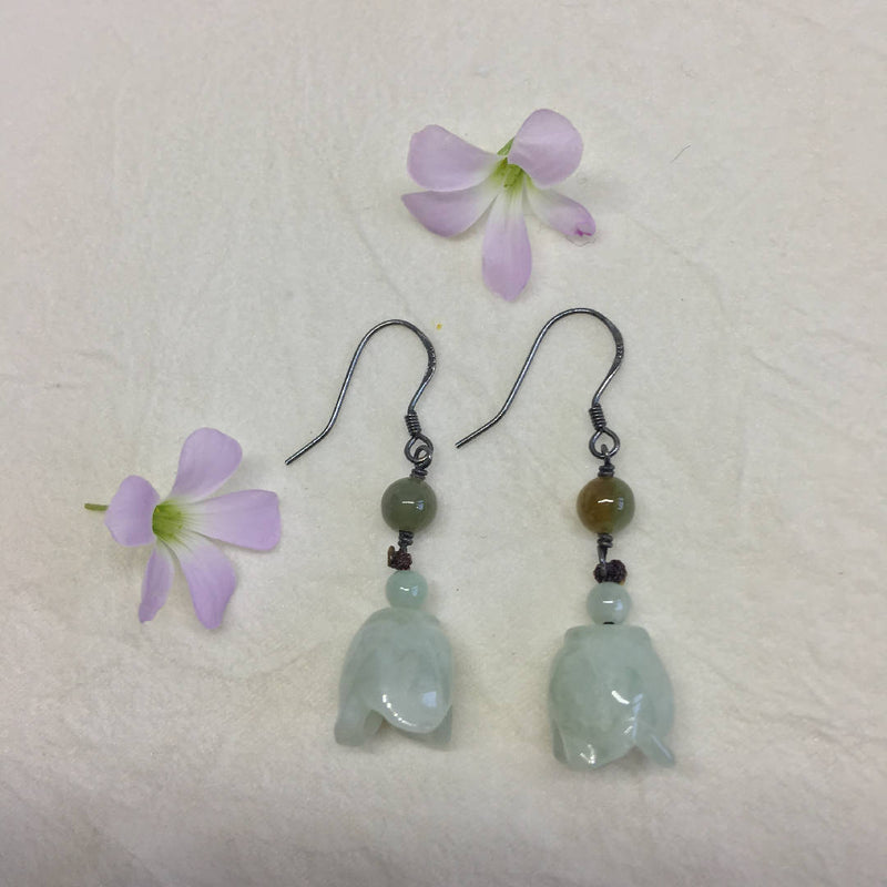 Natural Jade and 925 sterling silver earrings.