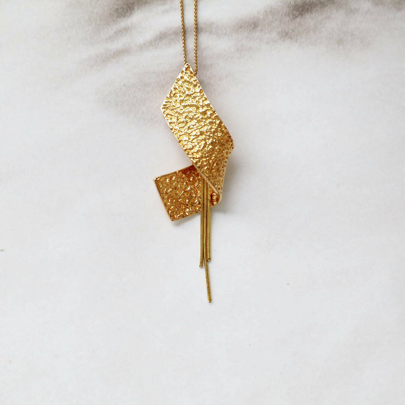 Moon rock twisted pendant -gold colour