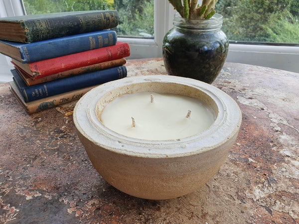 stoneware mortar candle with 3 wicks