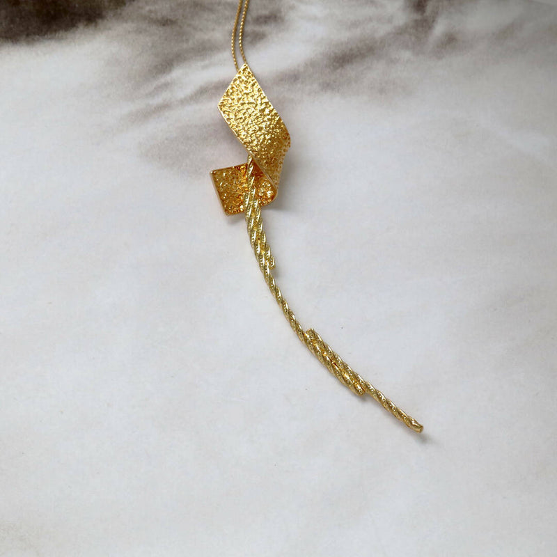 Moon rock twisted pendant -gold colour